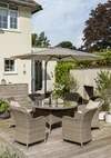 0195530-6009-0195536-6009-charlbury-6-seat-dining-set-with-pfr30-927-round-free-arm-parasol-lifestyle-(1).jpg