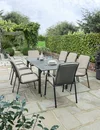 c9511-0200-51s937-t0296-0200-savita-8-seat-extending-table-set-lifestyle.jpg