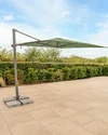 pcls33-935-c-luna-3x3m-parasol-meadow-green-canopy-open-inc-base-portrait-lifestyle.jpg.jpg