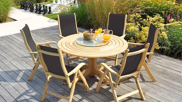 alexander-rose-roble-round-dining-set-with-6-charcoal-sling-recliners.jpg