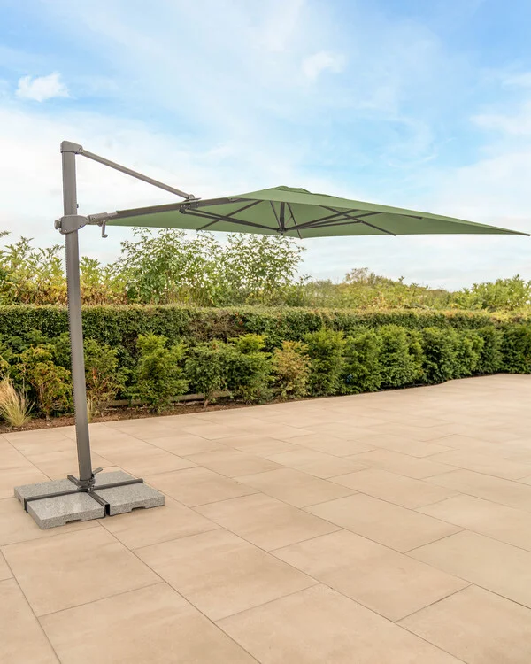 pcls33-935-c-luna-3x3m-parasol-meadow-green-canopy-open-inc-base-portrait-lifestyle.jpg.jpg